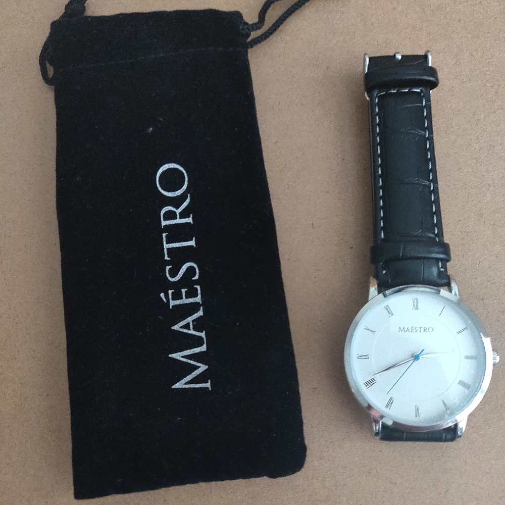 Maestro white dial watch with black strap